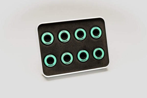 Quantum x SNOT Particles Metallics Skateboard Bearings
